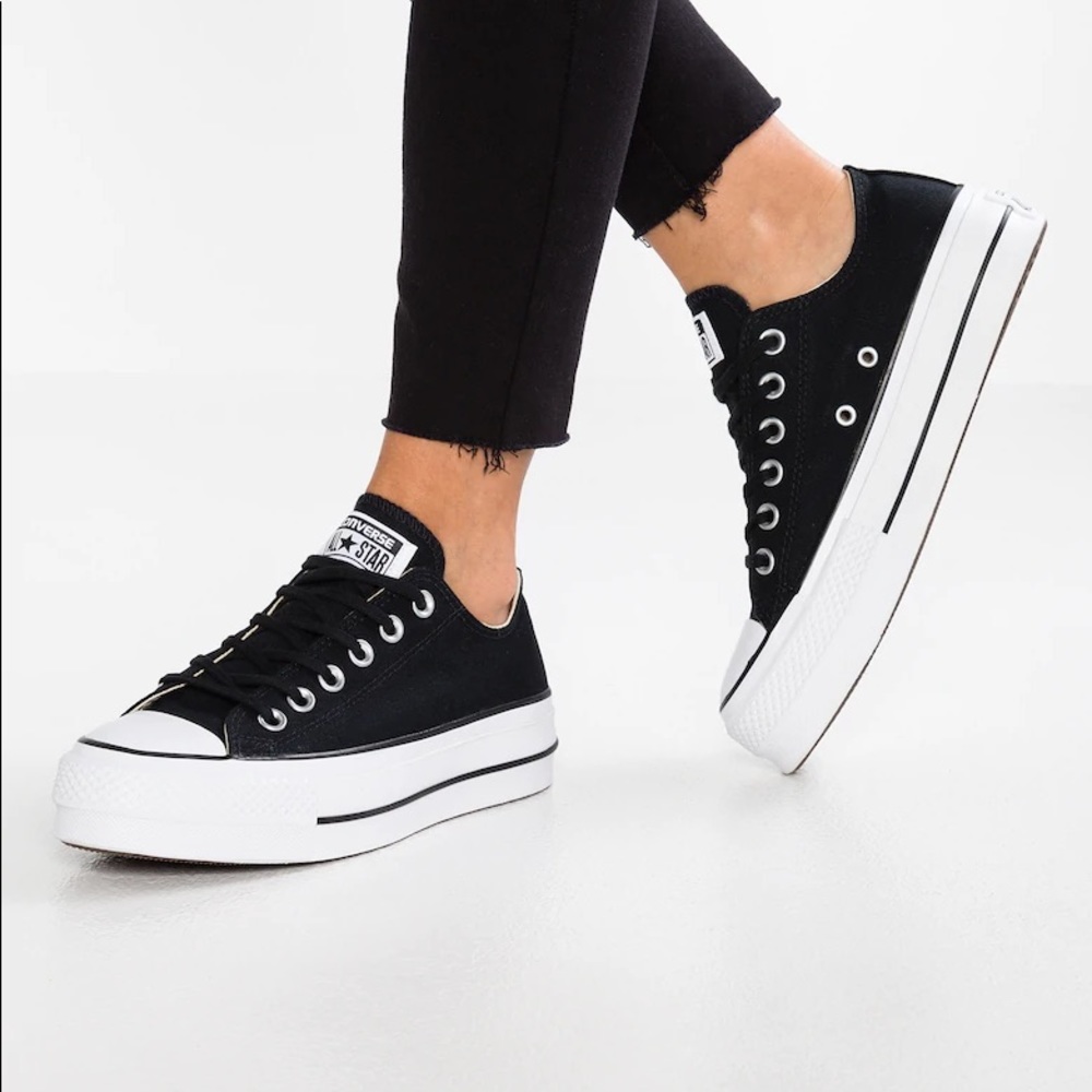 Women’s Black Platform Converse.